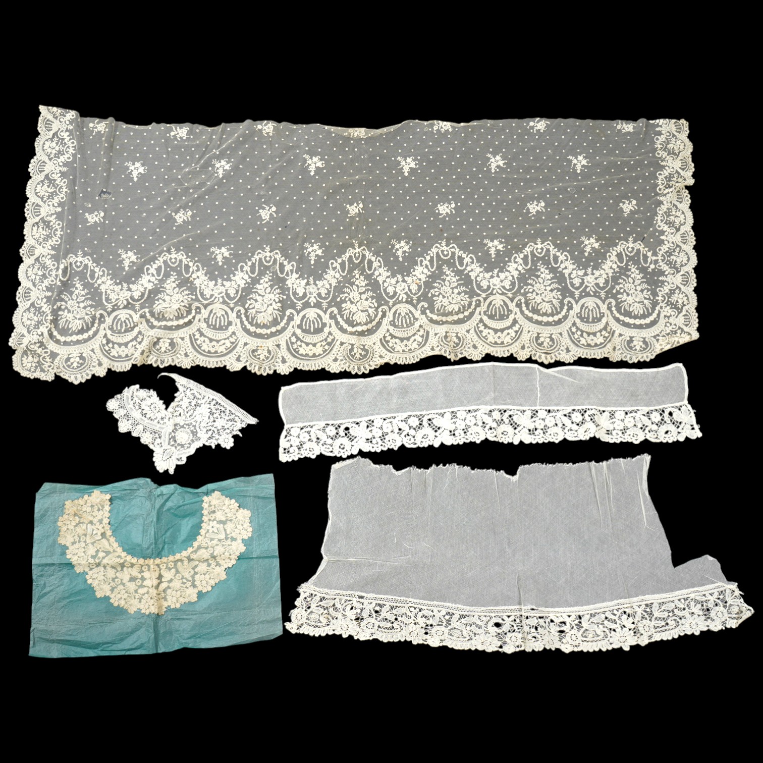 A late 19th century Brussels bobbin lace on net section of a wedding veil, Brussels bobbin lace collar, a point de gaz lace motif and two lengths of later bobbin lace trimming possibly Honiton with needle lace insertions